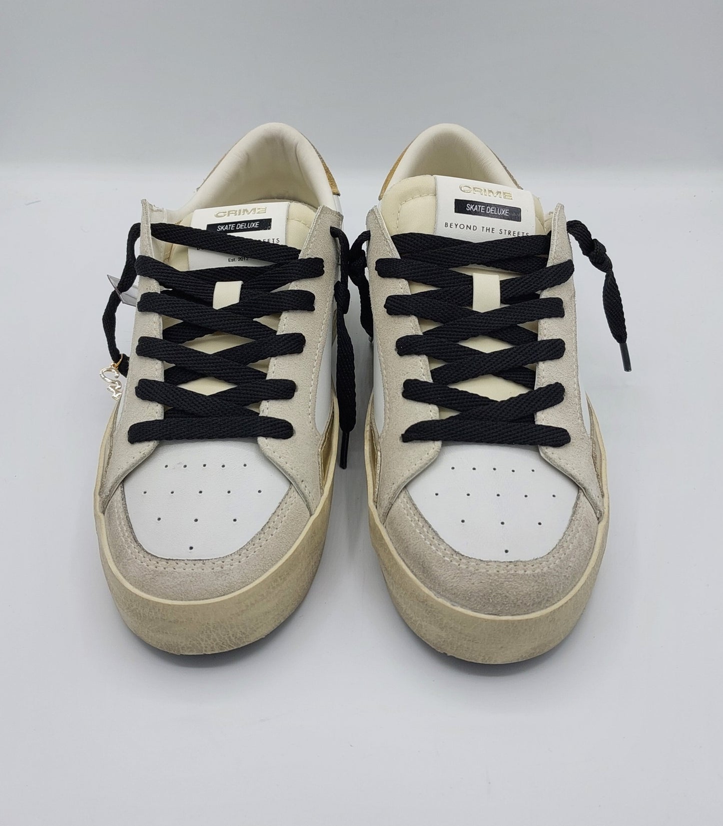 Baskets femme Crime London en cuir blanc