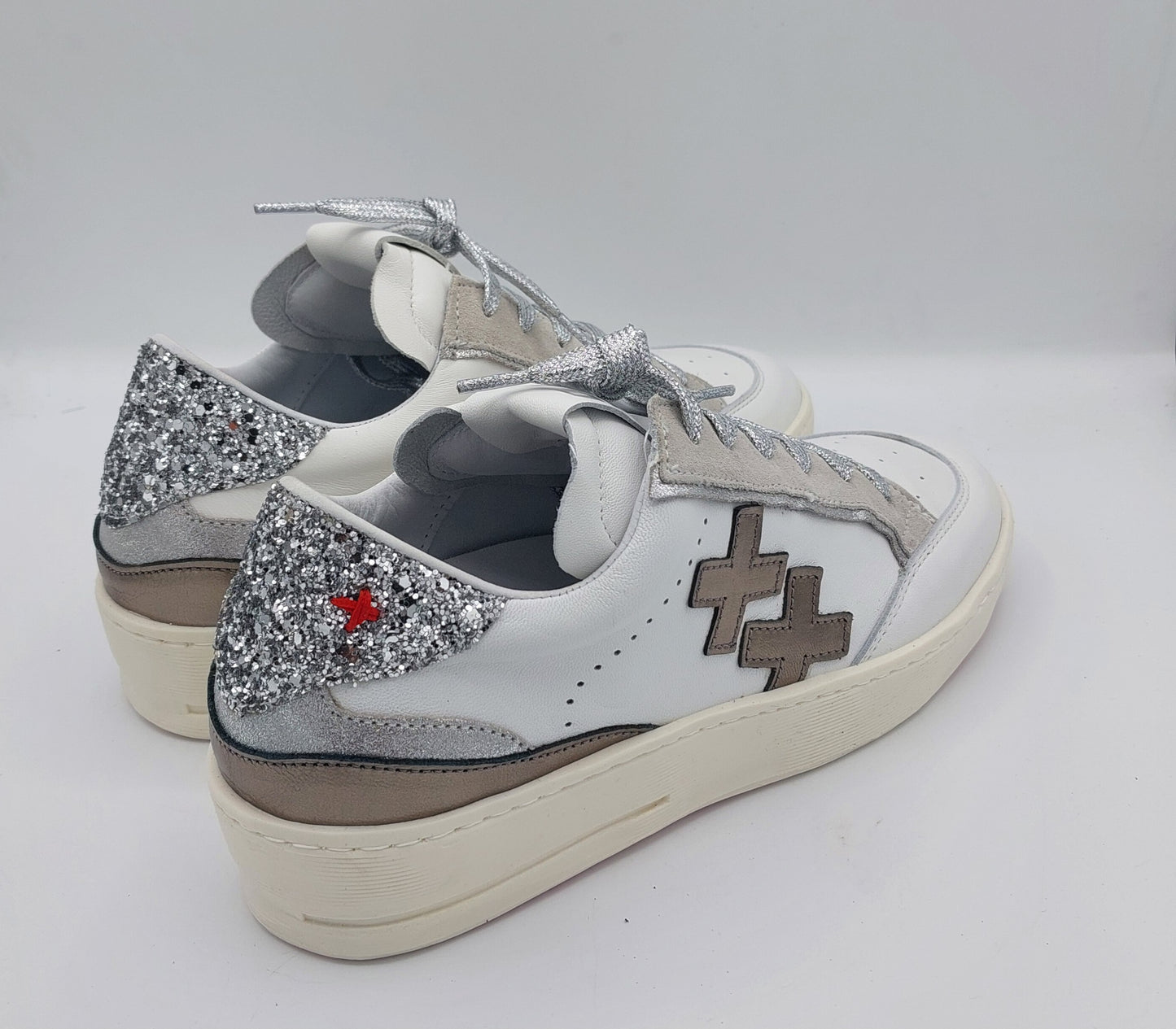 Gio+snekers in pelle bianca con zeppa interna