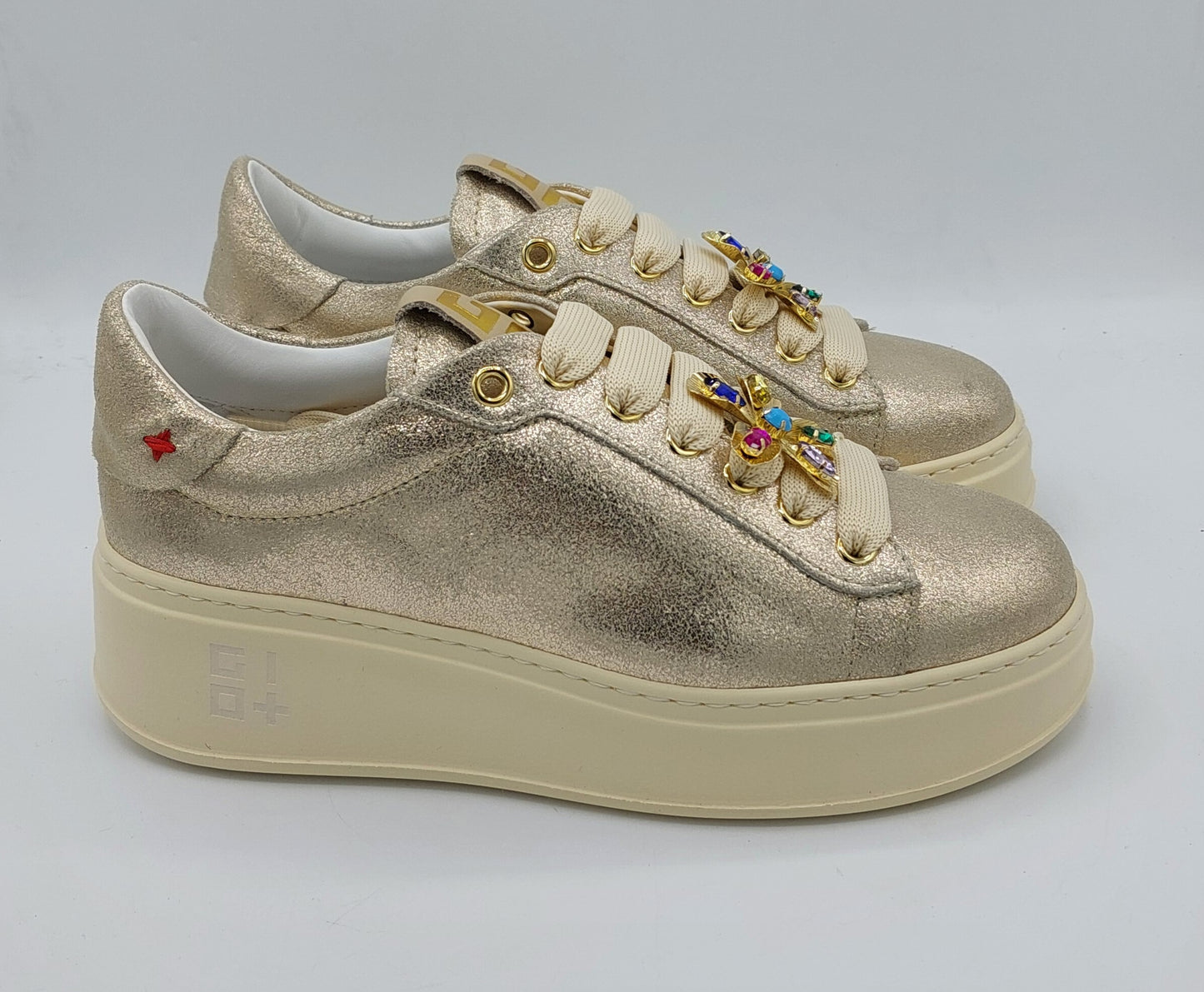 Gio+ sneakers oro con fiore